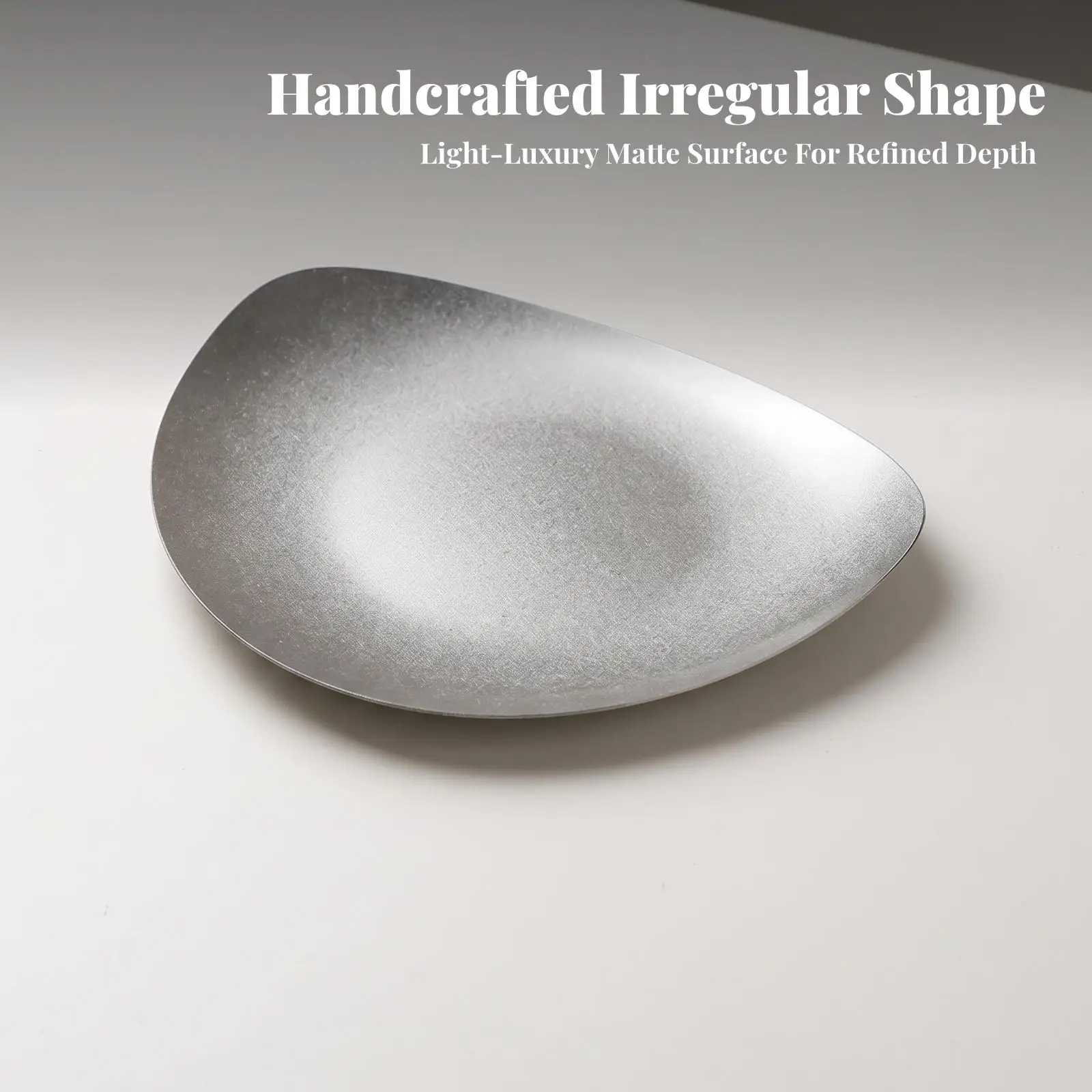 irregular-triangular-plate-smooth-metal-finish-finish-asymmetrical-plate-for-restaurant-plating
