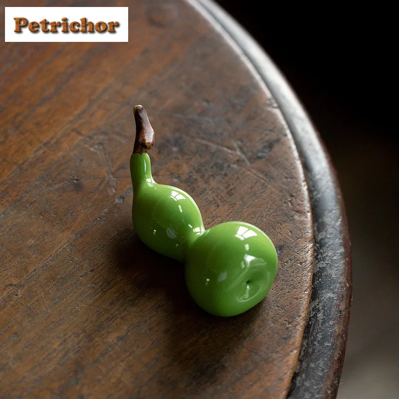 

Керамическая зеленая глазурованная тыква ручной работы, чайный бутик для домашних животных, счастливая модель, фигурка чая, игрушки, статуя чая, украшения, можно поднимать, подарок