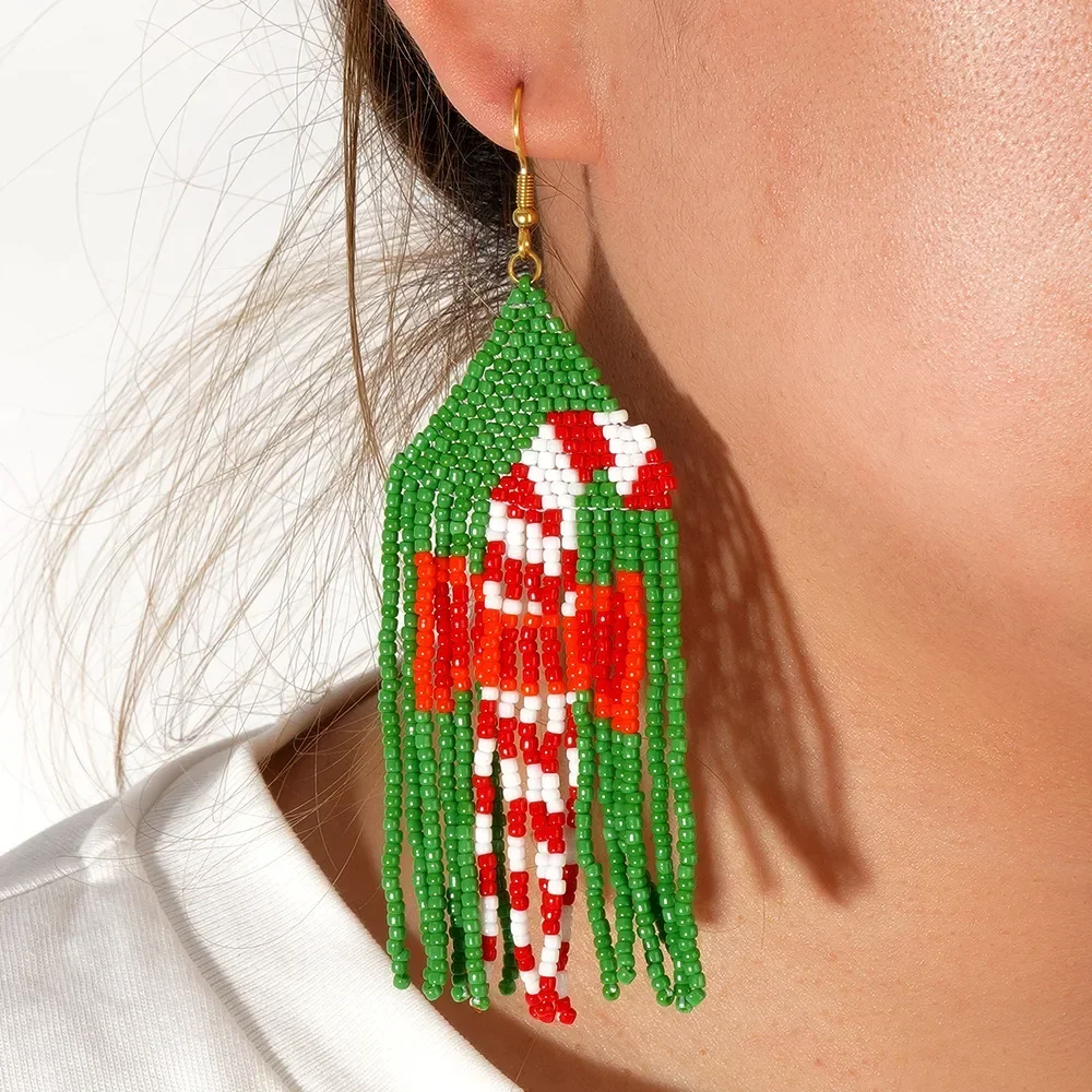 

Beaded earrings Tassel Christmas Walking stick Design Female Hand knitting Bohemia Alloy Crutch Tide Simple Rice bead earrings