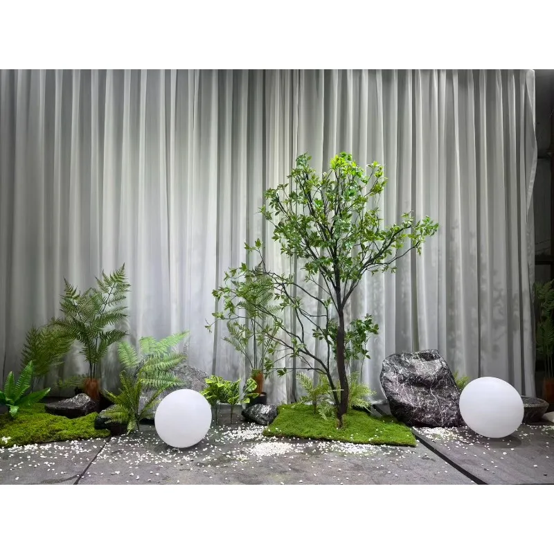 Elegant Floor Decoration Artificial Plant Landscape Design Solution Silk Green Plants Displayed in a showcase Window