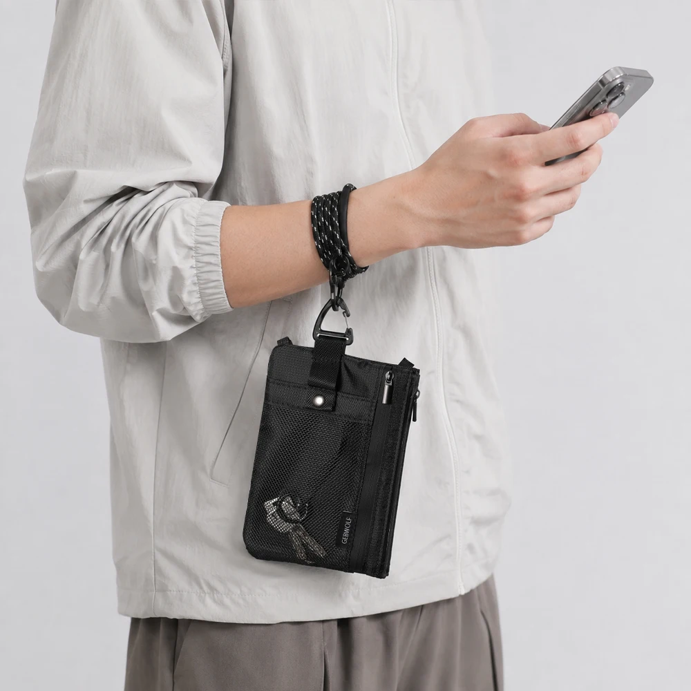 RFID-blockierende Reisebrieftasche mit Pass- und Handyfach, abnehmbarem Trageband und Schlüsselring, leichte Reisebrieftasche. – Detail 8