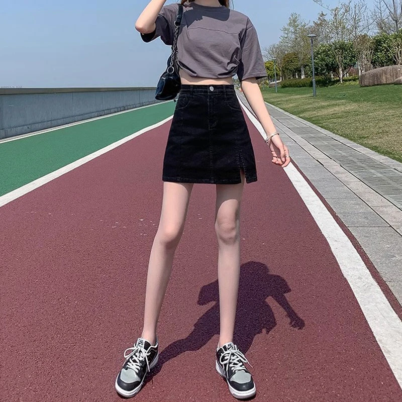 Thin section summer black denim skirt female bustier elastic high-waisted open fork anti-glare a word package hip pants skirt