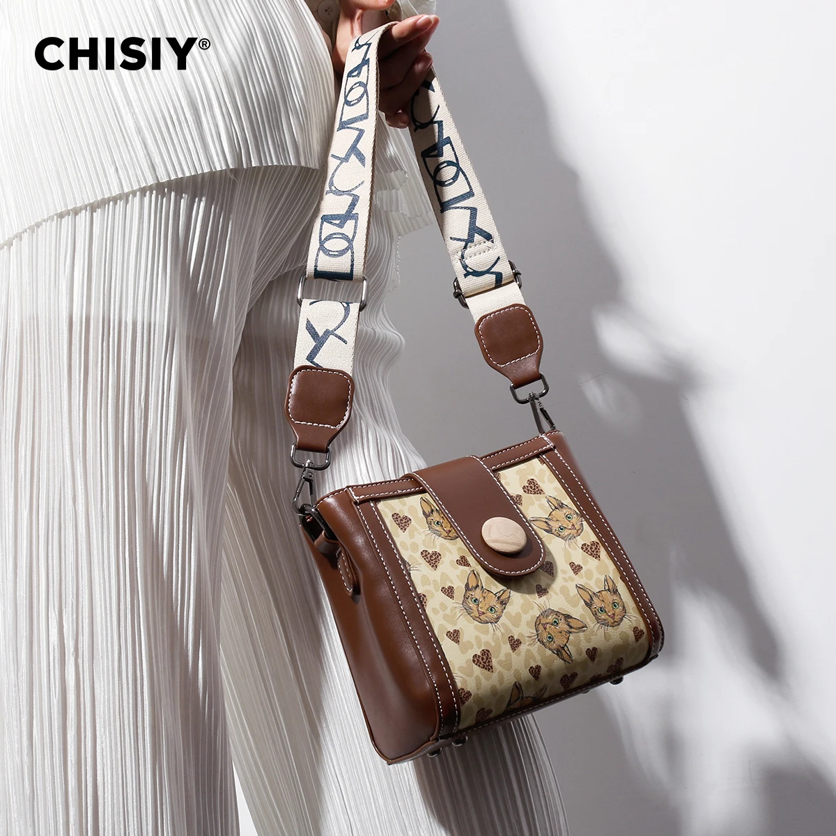 CHISIY Original handmade minimalist texture cartoon embossed cat versatile commuting single shoulder crossbody bag