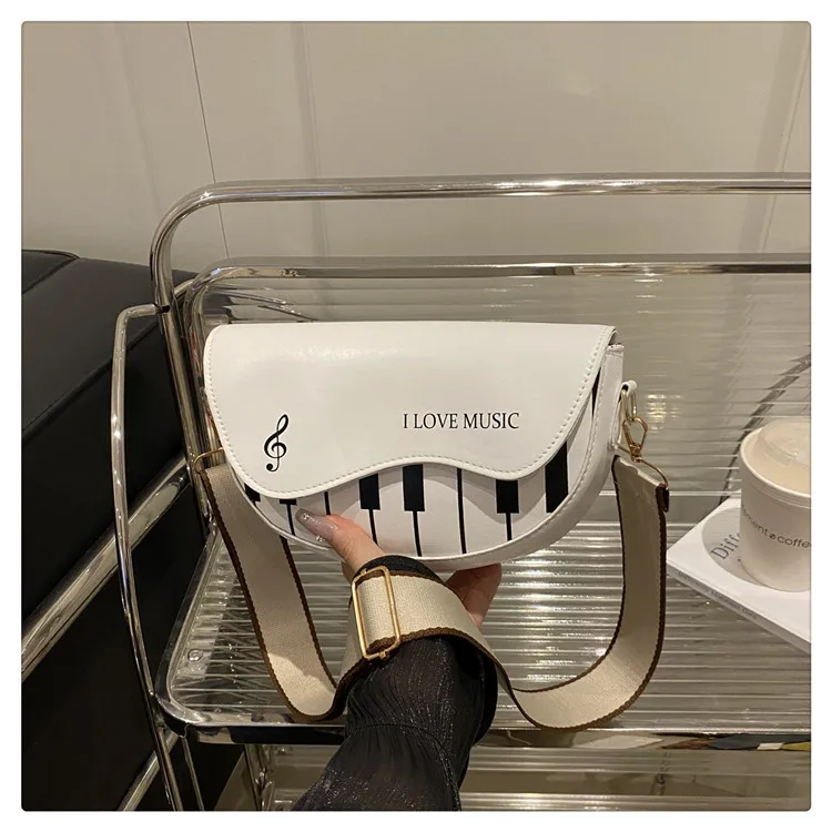 

2025 Womens Musical Note Purse Elegant Small Shoulder Bag Chic Crossbody Hand Carry Clutch