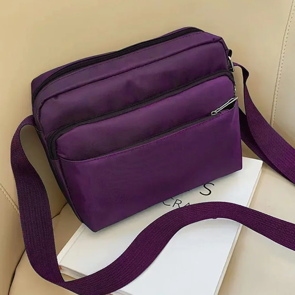 Bolso cruzado morado de un hombro, bolsa de almacenamiento portátil de gran capacidad con estampado de flores y letras negras