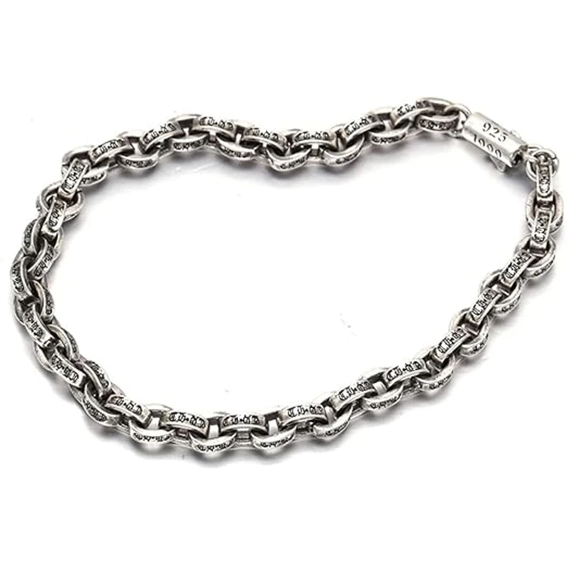 قلادة وسوار فضي اللون، منقوشة بأنماط وتصميم مشبك توقيع عام 1995. #3