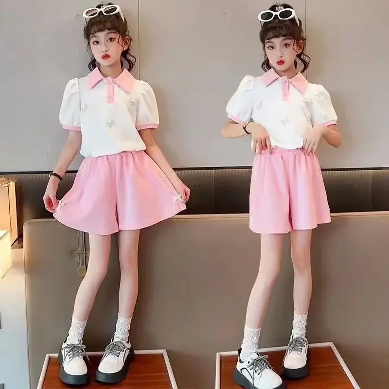 

2025 НОВАЯ летняя футболка с короткими пышными рукавами и бабочкой для девочек-подростков + горячие короткие штаны, детский комплект 6, 7, 8, 9, 10, 11 12 лет