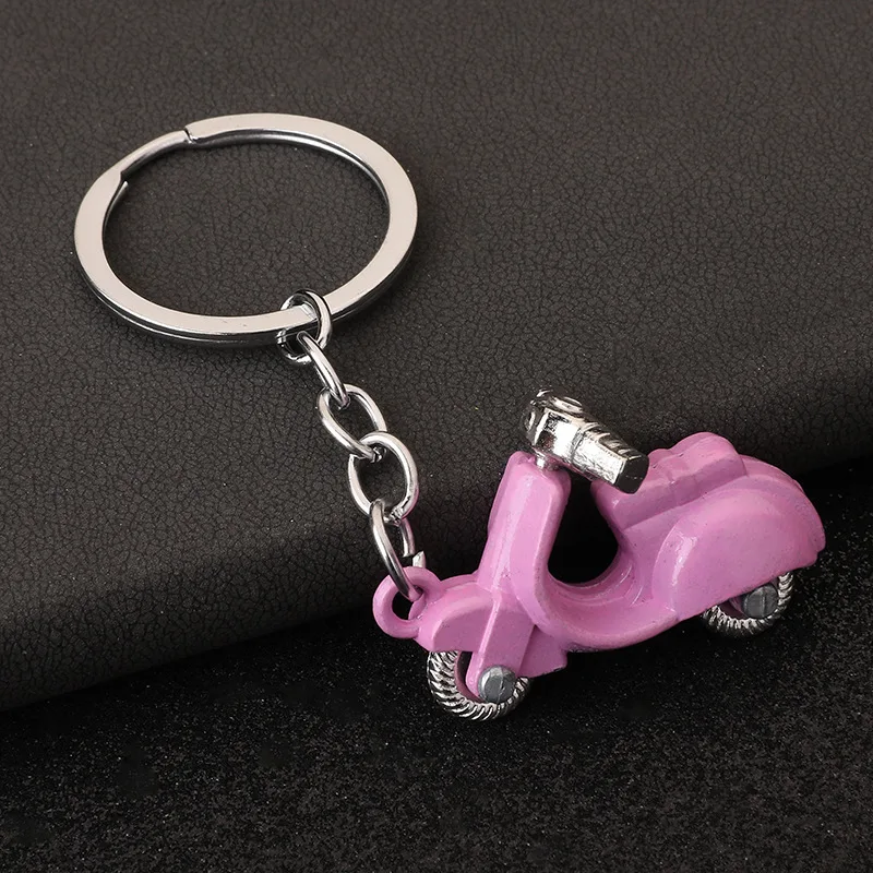 Punk keychain pendant pendant colorful Seiko products figure toy retro motorcycle direction wheels can be turned