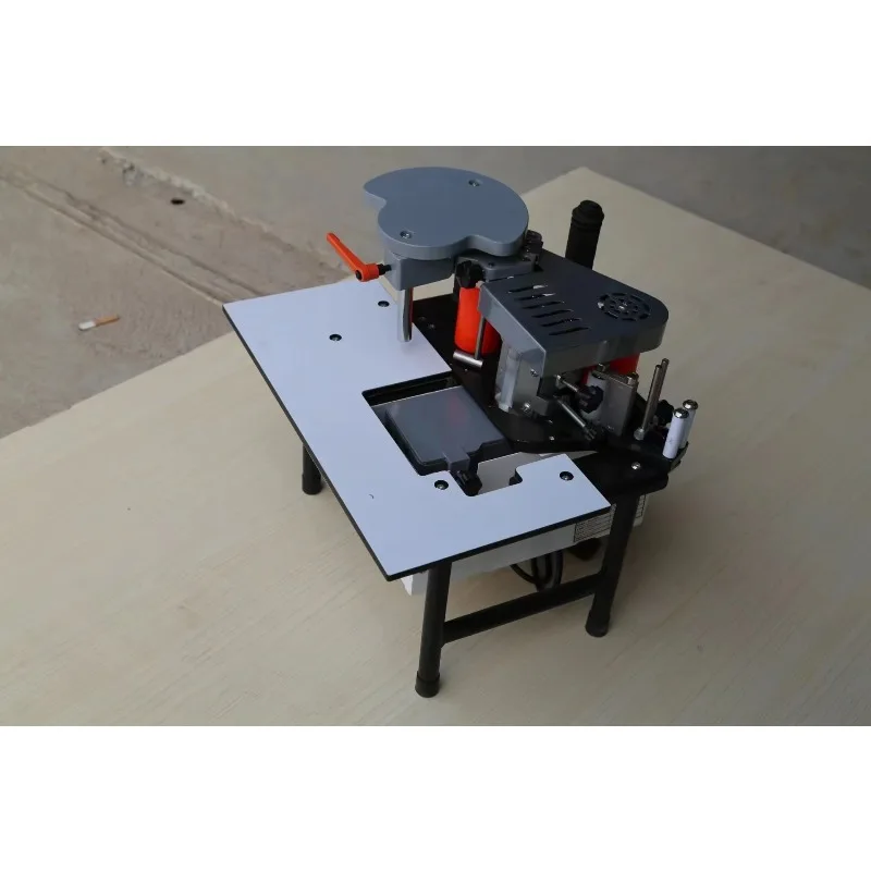 

Портативный ручной автоматический прецизионный кромкооблицовочный станок SY-MINI, подходящий для различных видов кромкооблицовочных полос.