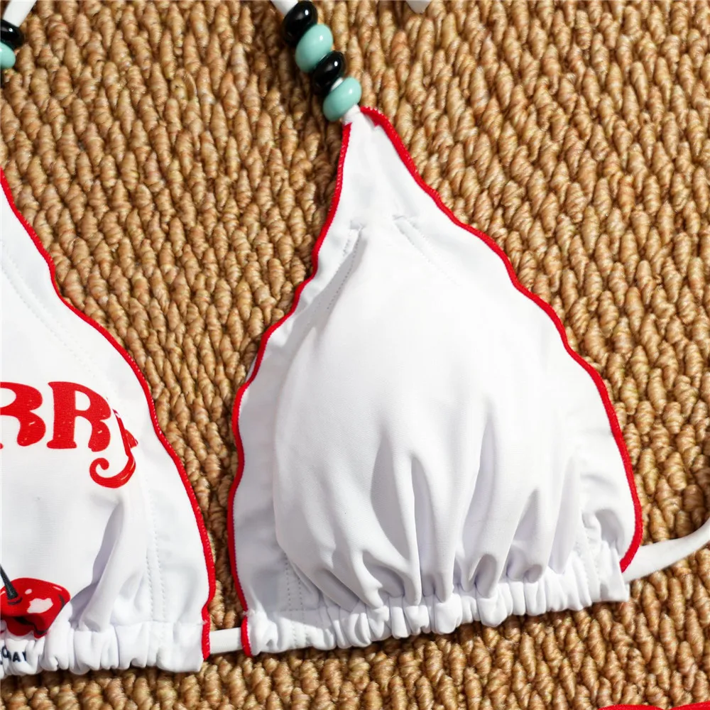 セクシーなチェリープリントの三角形ストリングホルタービキニセット、ボウノット付きTバック水着、女性用2026ビーズレースアップ水着ビキニムヘール