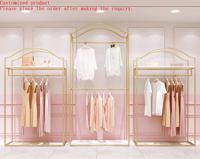 

Shinny Gold Clothing Rack Apparel Retail Stainless Steel Clothes Shelving Garment Display Rack Clothing Store Furniture