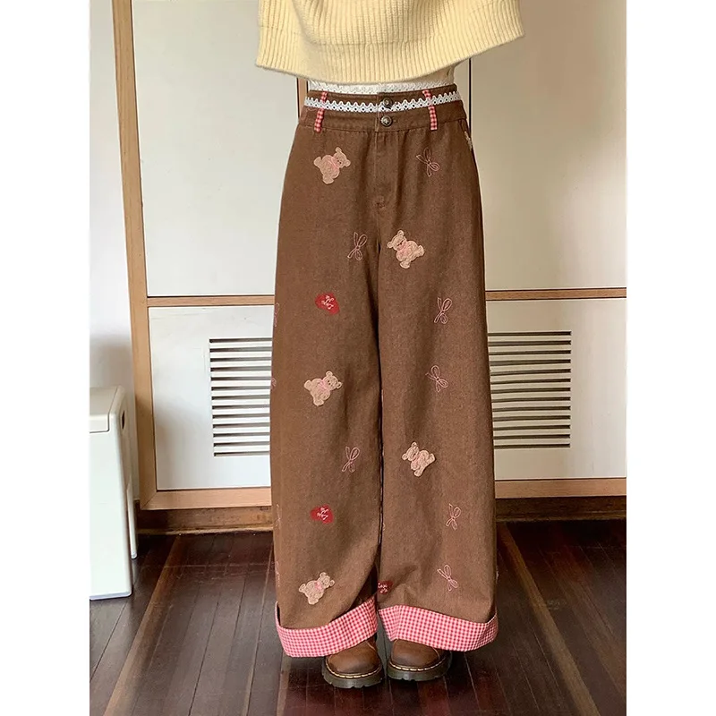 

Джинсы женские джинсовые в полный рост с принтом джинсовые манжеты брюки с высокой талией и карманами сращенные 2025 повседневные базовые брюки на молнии свободный крой