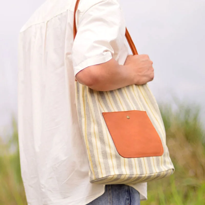 AETOO Nova bolsa de ombro único de couro da moda, sacola de ombro único versátil listrada da moda, masculina de couro simples e w