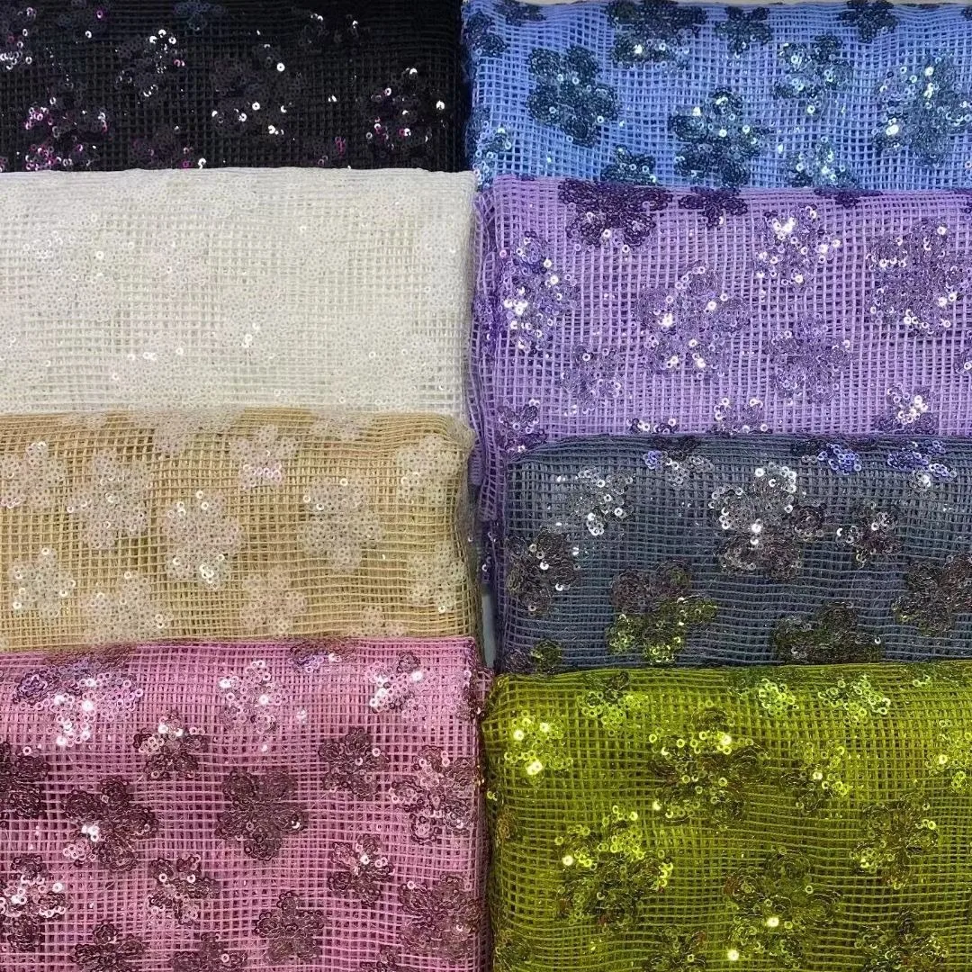 

Multi-color embroidery fabric Mesh sequined fabric Stage sequined mesh embroidery Multi-color embroidery fabric Batch skirt