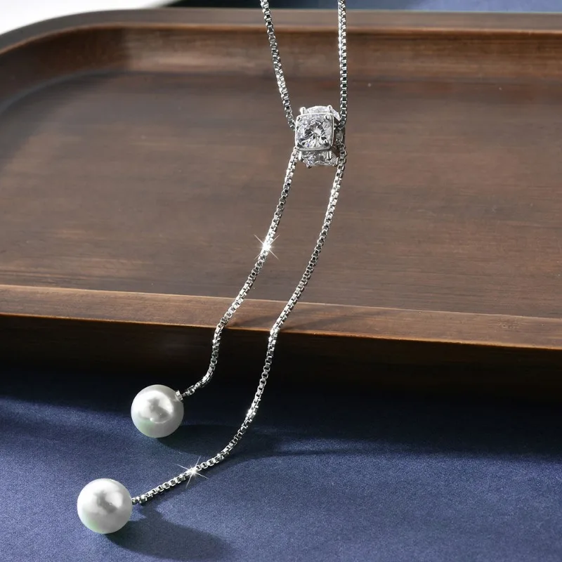 

Autumn and winter fashion, simple and stylish long tassel necklace, women's tassel zircon cube sweater chain