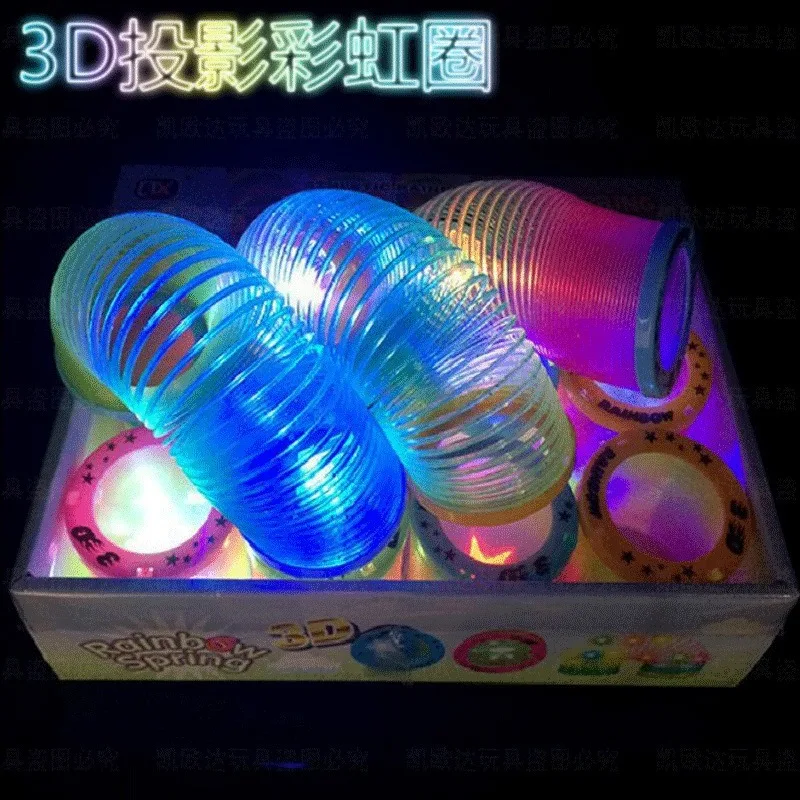 Wholesale hot selling5 spiral games Rainbow colorful pull ring stress resistant shiny children's toys Fun children's party gifts