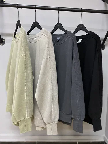 

2025 New Washed Dyed Distressed Hem Slit Sleeve Crew Neck Sweatshirt Multiple Colors Available