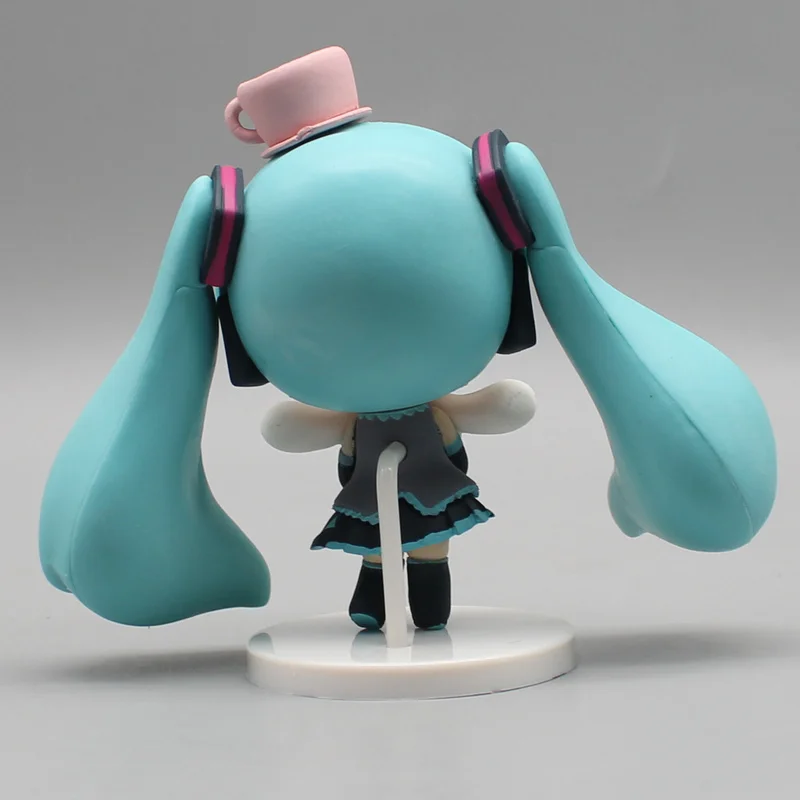 Hatsune Miku figurka Anime trzymająca fasolę cynamonową z oczami Kawaii dekoracje na stół lalki figurki akcji Model dzieci