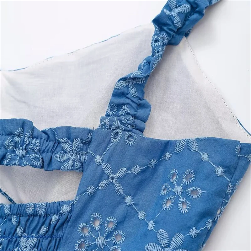 Keyanketian 2025 verão novo vestido feminino bordado deslizamento beachwear férias vento sem costas oco em camadas sem mangas mini vestido