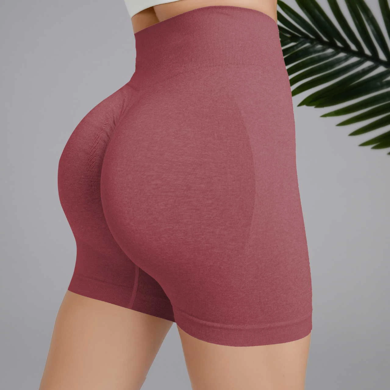 Pantaloni da Yoga Leggings attillati corti pantaloni da Fitness con anca a cuore pantaloni a vita alta con sollevamento dell'anca pantaloni sportivi senza cuciture