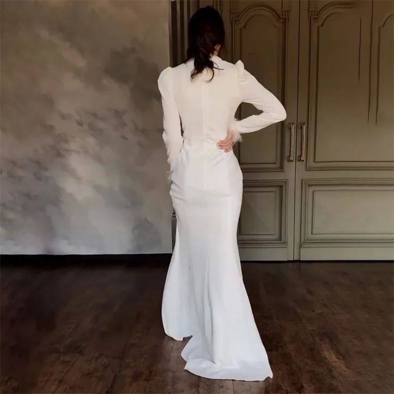 فساتين سهرة رسمية رائعة مخصصة في دبي برقبة عالية وأكمام طويلة مطرز بالريش حورية البحر فساتين لحضور الحفلات الموسيقية 2025