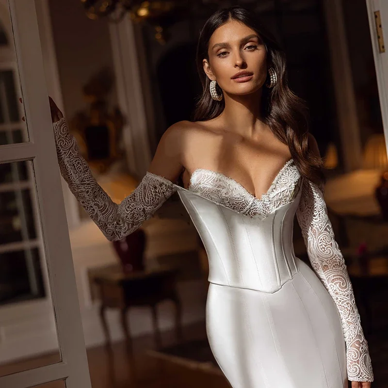 فستان زفاف حورية البحر مثير بدون حمالات على شكل قلب من الدانتيل بأكمام طويلة فستان زفاف بوهيمي للشاطئ فستان زفاف على شكل كرة حسب الطلب