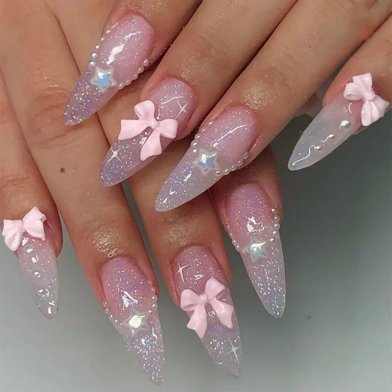 

Cute Aesthetic Pink Almond Gel False Nails with Bow Sweet Stars Sparkling Powder Pearl Fake Nail Art Finished Product Removable