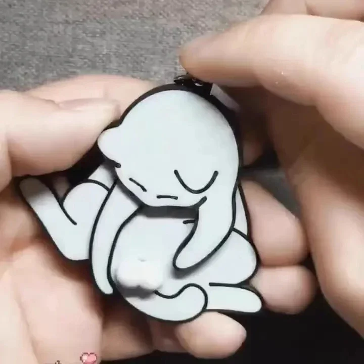 Kreativer Pull Play Egg Cat Anhänger Niedlicher und bizarre drehbarer Taschenanhänger Rucksack Geschenkspielzeug