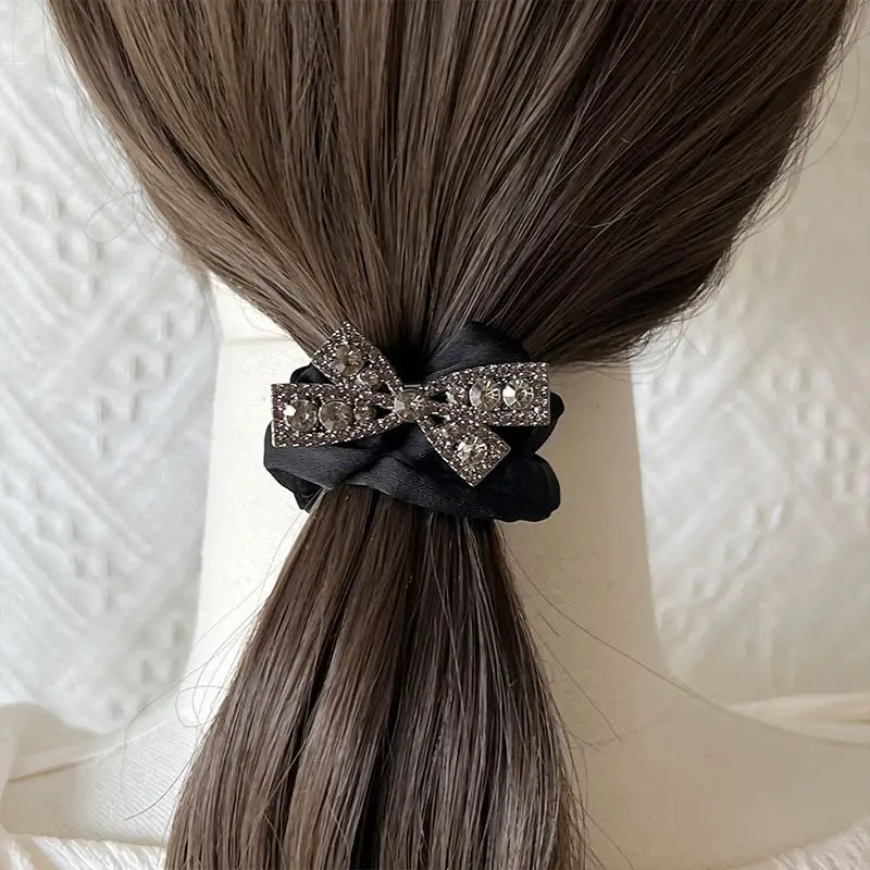 Moda Rhinestone Bow Scrunchies kobiety elastyczne gumki do włosów krawat gumka do włosów liny nakrycia głowy dziewczyny akcesoria do nakrycia głowy