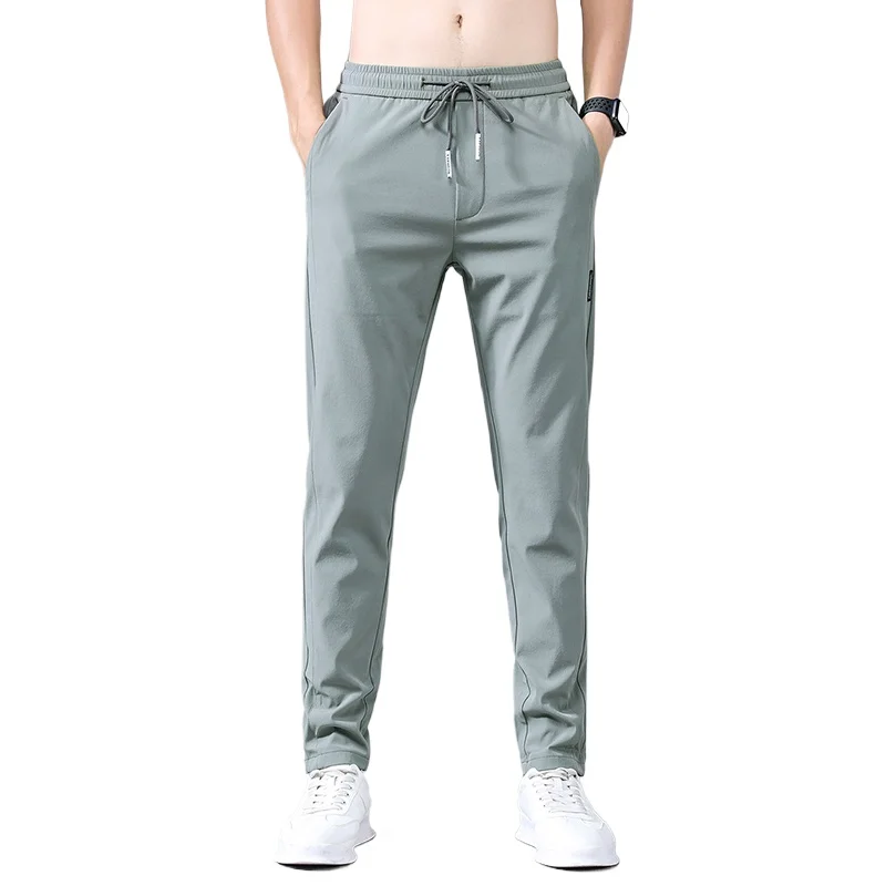 Pantaloni lunghi Casual da uomo nuovi pantaloni a matita Slim pantaloni dritti traspiranti moda maschile Stretch Khaki Jogging Streetwear uomo