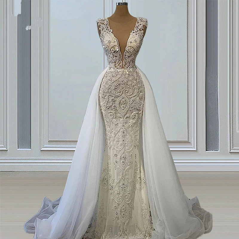 

Stunning Mermaid Deep V-Neck Heavy Beading Sequins Wedding Dress Sleeveless Applique Bridal Gown With Detachable Tulle Train