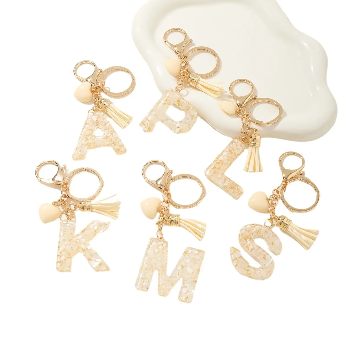 Best-selling letter keychain - resin heart-shaped hot glue shell stone letter keychain backpack accessory