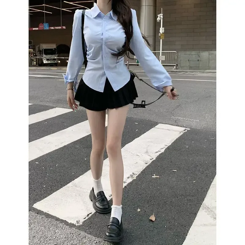 Camisa ajustada con cintura azul para mujer, Top adelgazante sin mangas, moda Primavera Otoño, sensibilidad de nicho, recién llegado