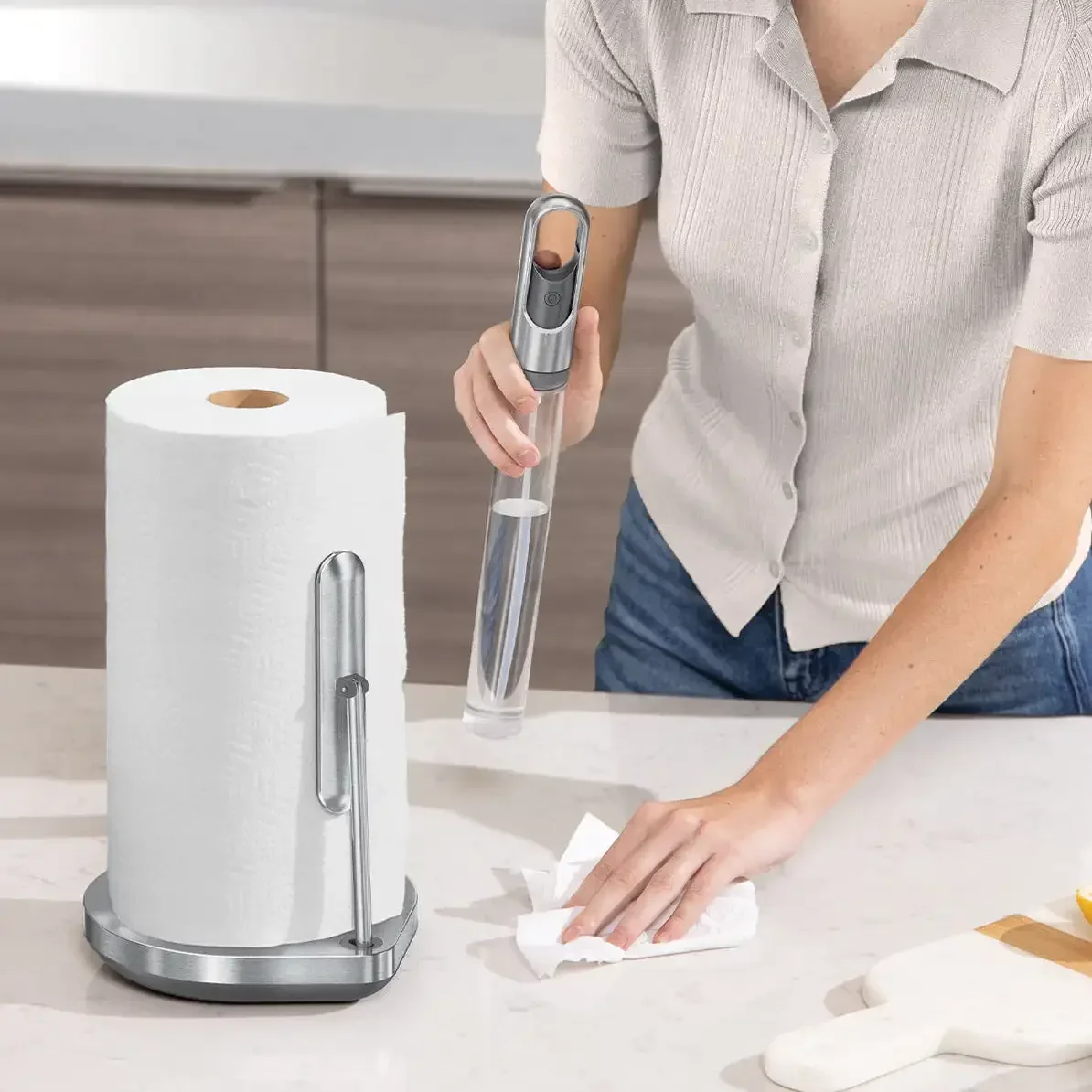 Stainless steel kitchen desktop tissue holder non-punching tension fixer tearing paper with one hand.