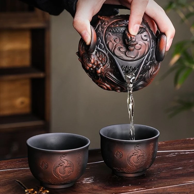 

Purple Clay Handcrafted Relief-Carved Flying Dragon Hand-Grip Teapot Travel Tea Set One Teapot with Two Cups Kung Fu Tea Set