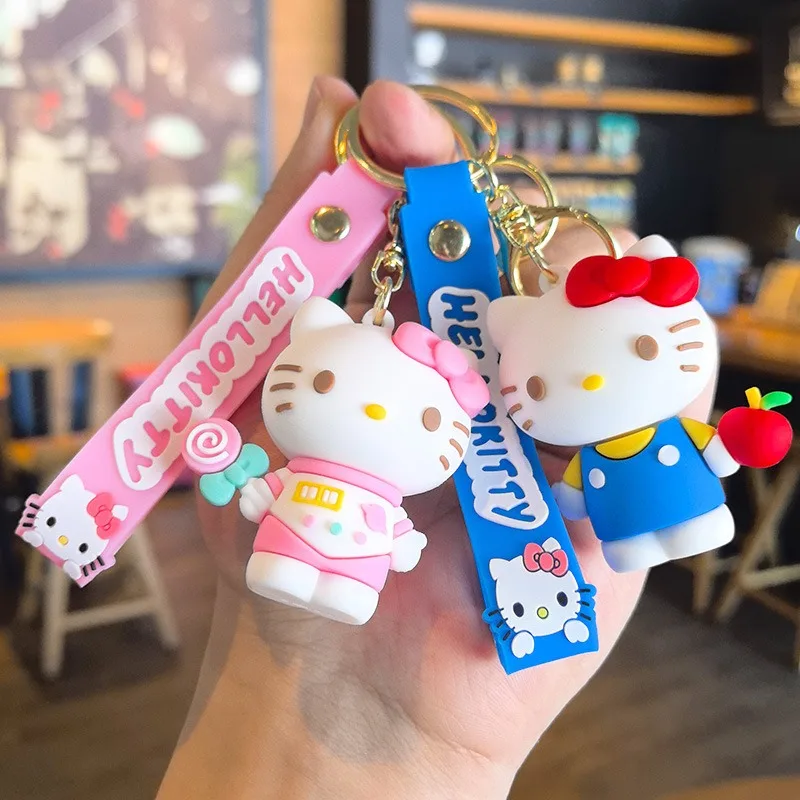 クリエイティブな韓国のかわいい漫画ハローキティシリーズキーホルダーペンダントPVCドールカーキーホルダーペンダントカップルバックパックキーホルダーペンダント