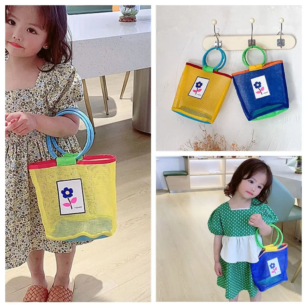 اللون الاصطدام شبكة حمل حقيبة شفافة قذيفة حقيبة التخزين الأطفال حقيبة يد الجوف خارج الأم الاطفال حقيبة شبكة حقيبة شاطئية السفر