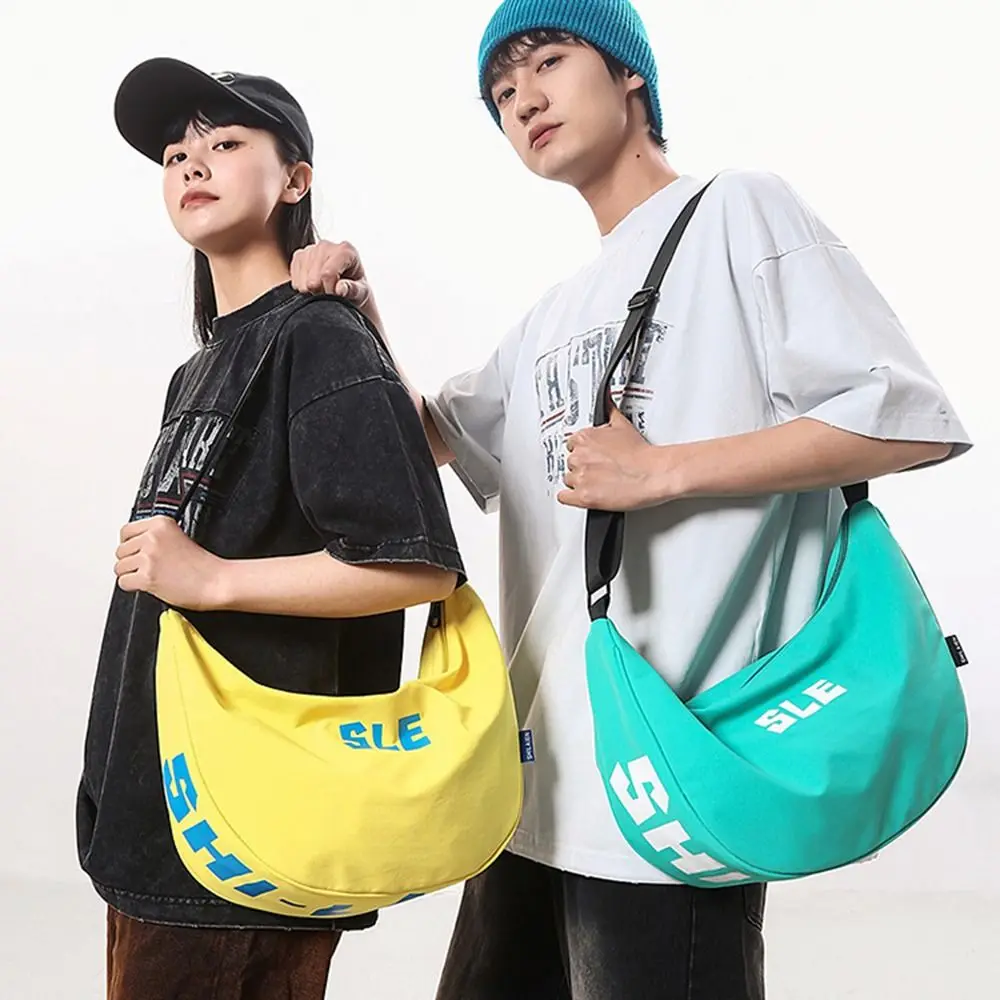 

Large Capacity Nylon Shoulder Bag Streetwear Multi-Functional Casual Chest Pack Solid Color Cool Japanese Style Dumpling Bag Man
