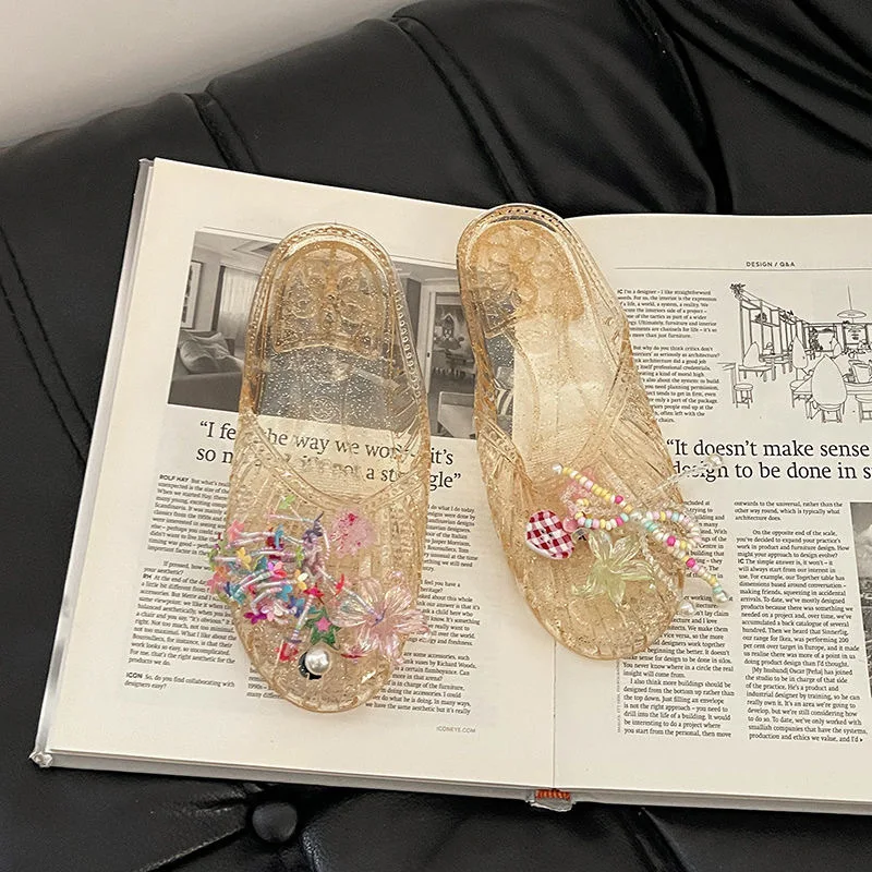 Jelly shoes women's Korean version fashion outer wear flat-soled bag head shoes transparent shoe flower accessories beach shoes view 2
