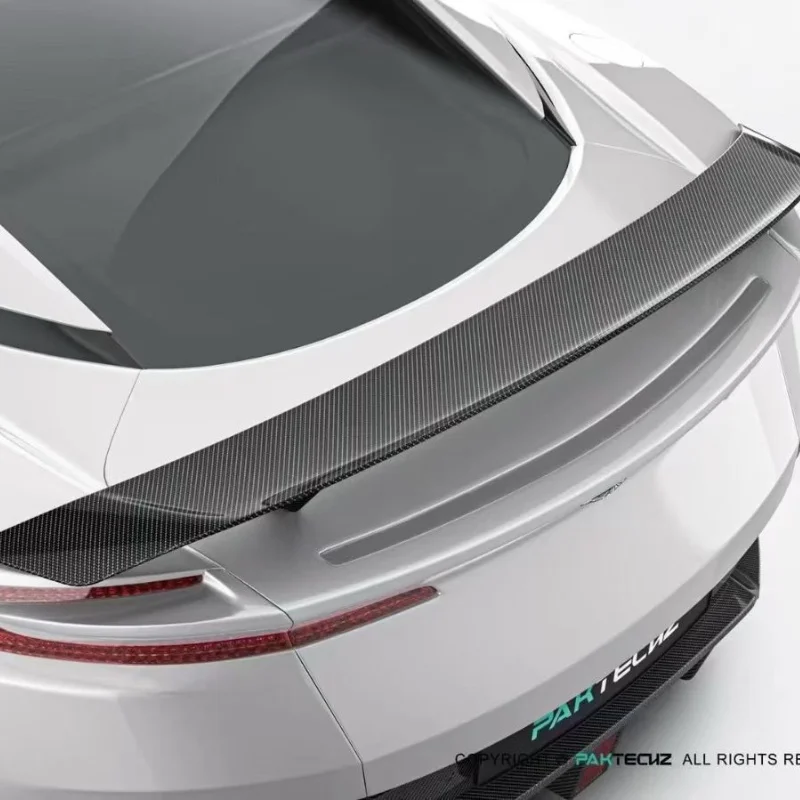 

Комплект обвеса из сухого карбона в стиле PK: задний спойлер и малый обвес для Aston Martin DB11 (тюнинг)