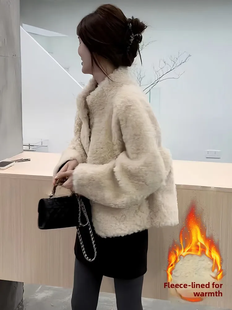 트렌디한 유럽 스타일 여성 겨울 신상품 안감이 있는 스탠드 칼라 가죽 퍼 따뜻한 상의