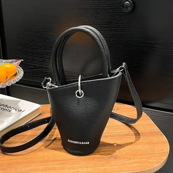 

Нишевая сумка-ведро 2025 года, портативная летняя новая летняя сумка через плечо с галькой, мини с буквами