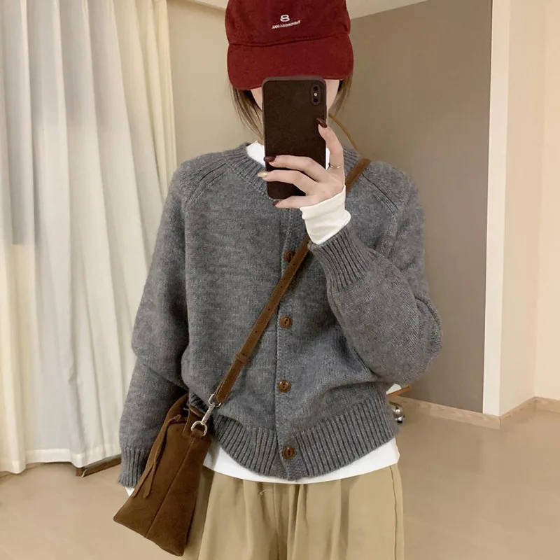 Design Sense: Solid Color, Simple Round Neck Knitted Cardigan for Women in Autumn and Winter, Lazy Style, Loose and Soft Texture 2