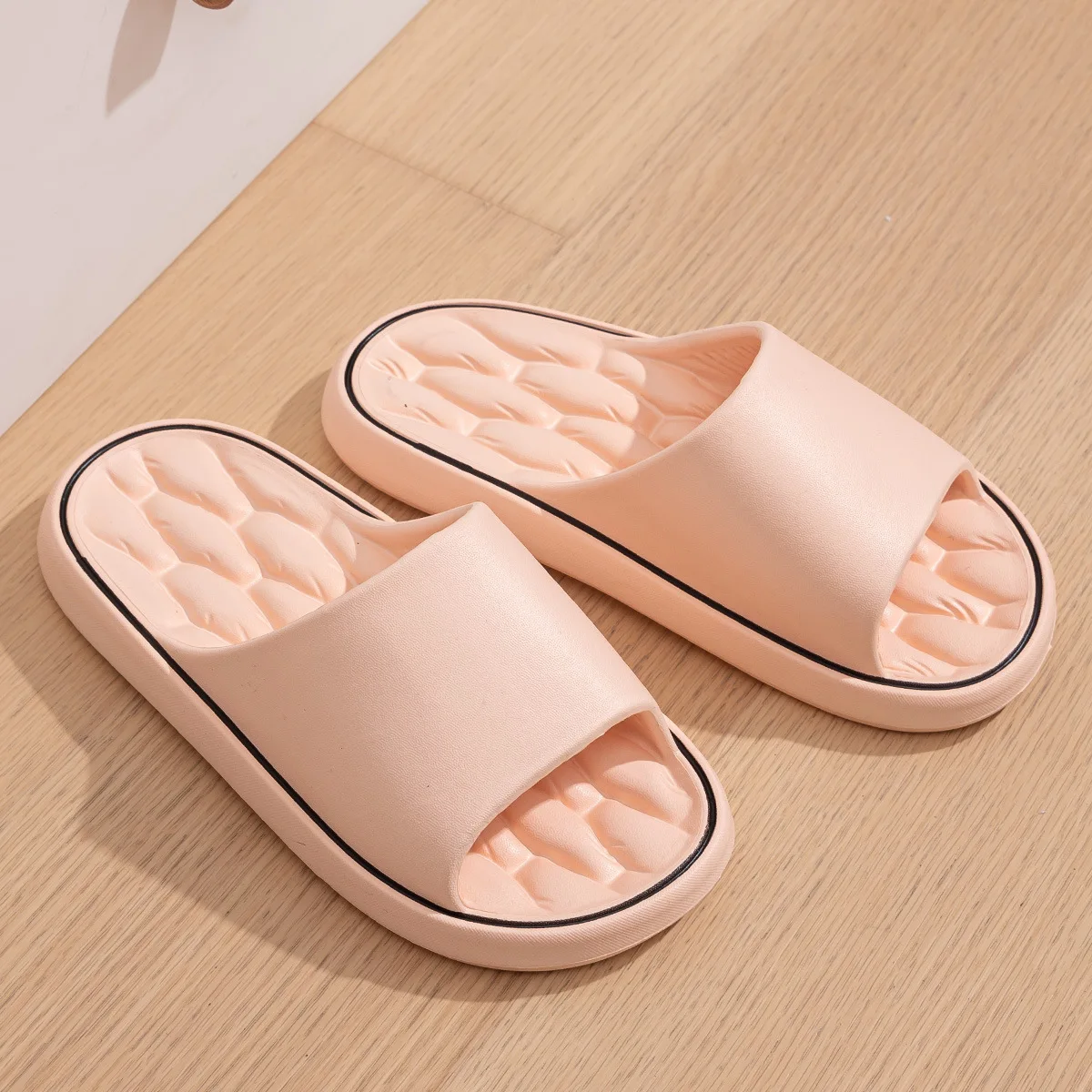 Pantofole da donna di nuova moda pantofole da bagno per la casa in EVA leggere piatte estive Comfort massaggio coppie scivoli per interni scarpe da doccia