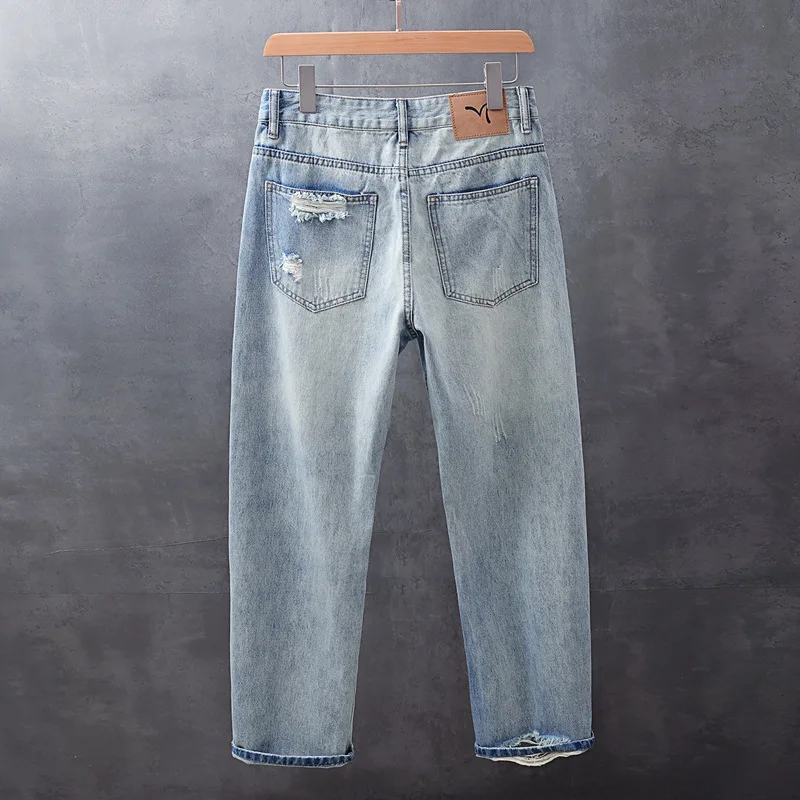 سراويل جينز ممزقة بأرجل واسعة من علامة تجارية أمريكية عالية الجودة للرجال بأنبوب مستقيم فضفاض بألوان متباينة