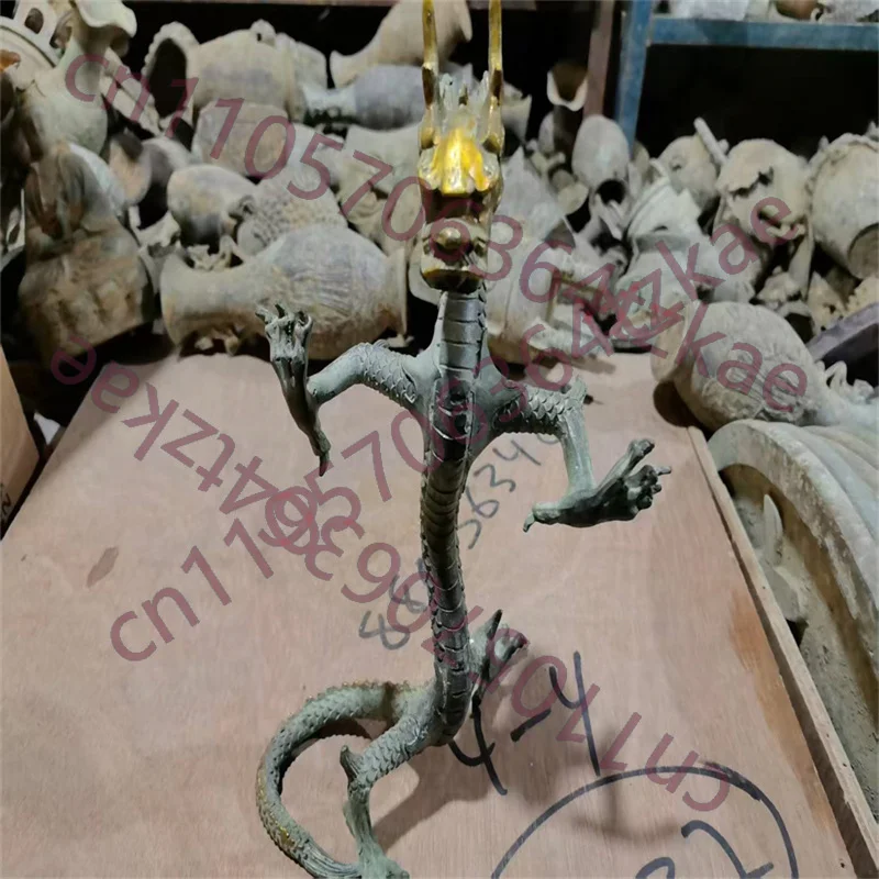 

Древняя бронзовая статуэтка, найденная в Китае, из коллекции FOLK: Медный позолоченный дракон.