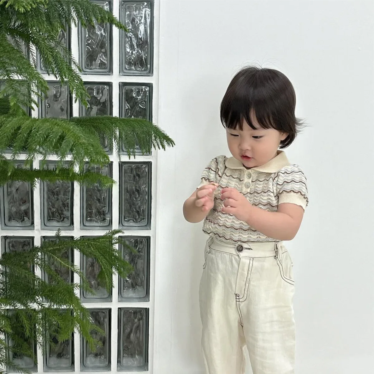 2025 Baby Clothes Summer Boys and Girls Small Lapel Temperament Jacquard Two Button Sweater Top Baby Short Sleeved Thin Sweater
