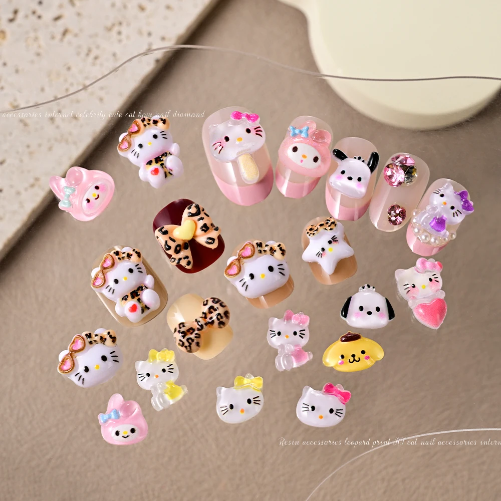 50 teile/beutel Leopard Print Hallo Kitty Nail art Charms 3D Kawaii Harz Herz Sonnenbrille KT/Bogen Nagel Dekor DIY mode Nagel Teile
