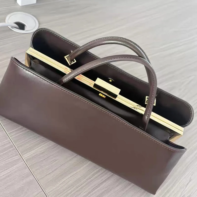 Hoogwaardige metalen frame clip tas dames luxe pu handtassen meerlaagse magnetische gesp portemonnee Franse nieuwe elegante onderarmtas