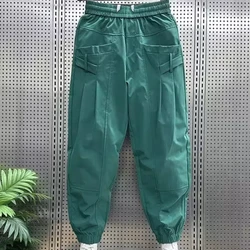 Frühling Herbst neue Mode elastische Taille Kordel zug Herren bekleidung lässig lose gebundene Füße Trend koreanische Taschen schicke Cargo hose